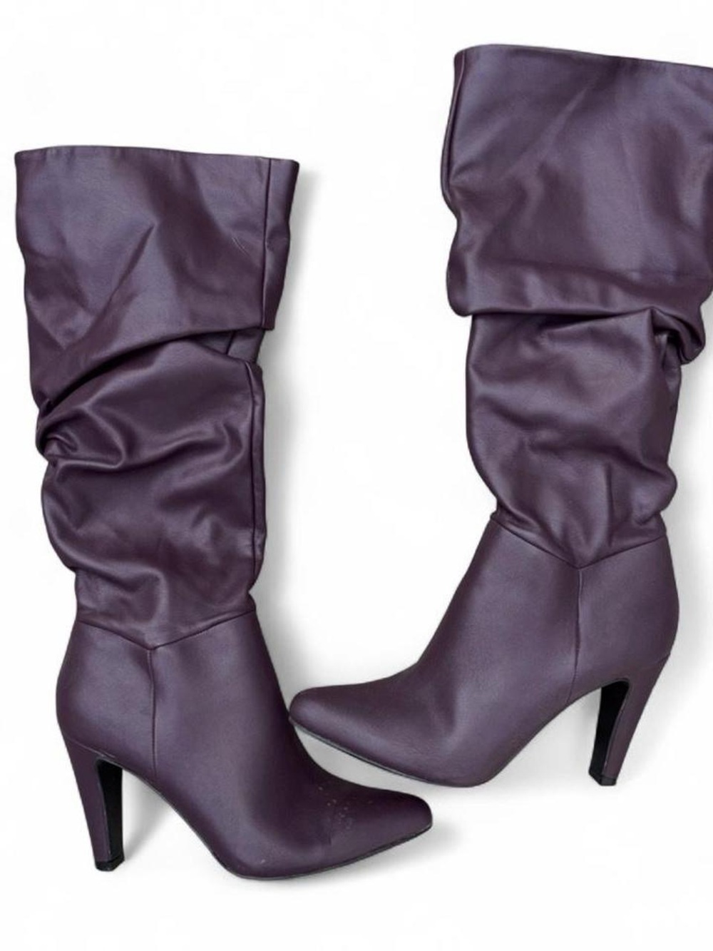 Purple faux leather heeled boots from Christian Siriano